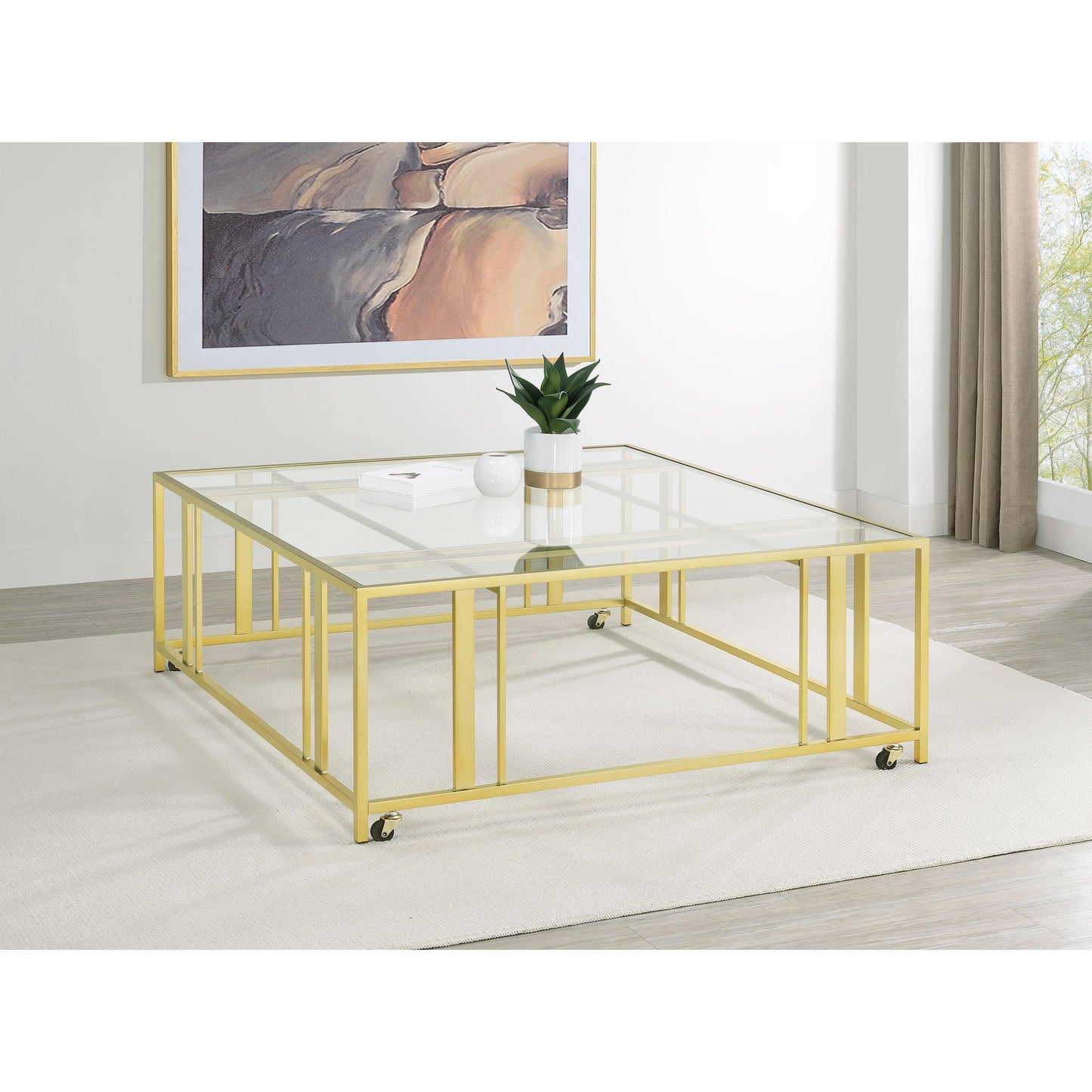 Coaster Furniture Adri 710188 Square Glass Top Coffee Table with Casters - Matte Brass IMAGE 2