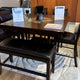 Lease-to-own no credit needed sign on a dining set at Palacio Furniture