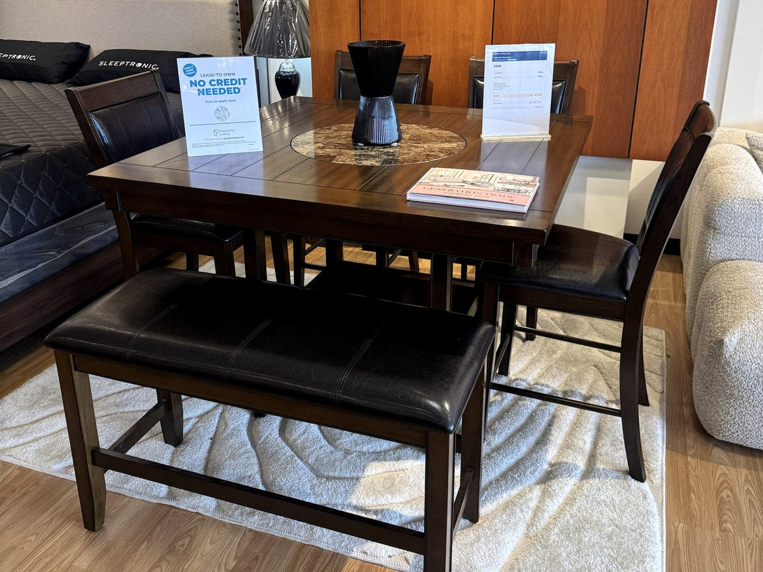 Lease-to-own no credit needed sign on a dining set at Palacio Furniture