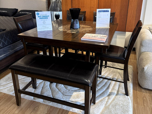Lease-to-own no credit needed sign on a dining set at Palacio Furniture
