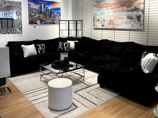 Black plush sectional in the Palacio Furniture showroom