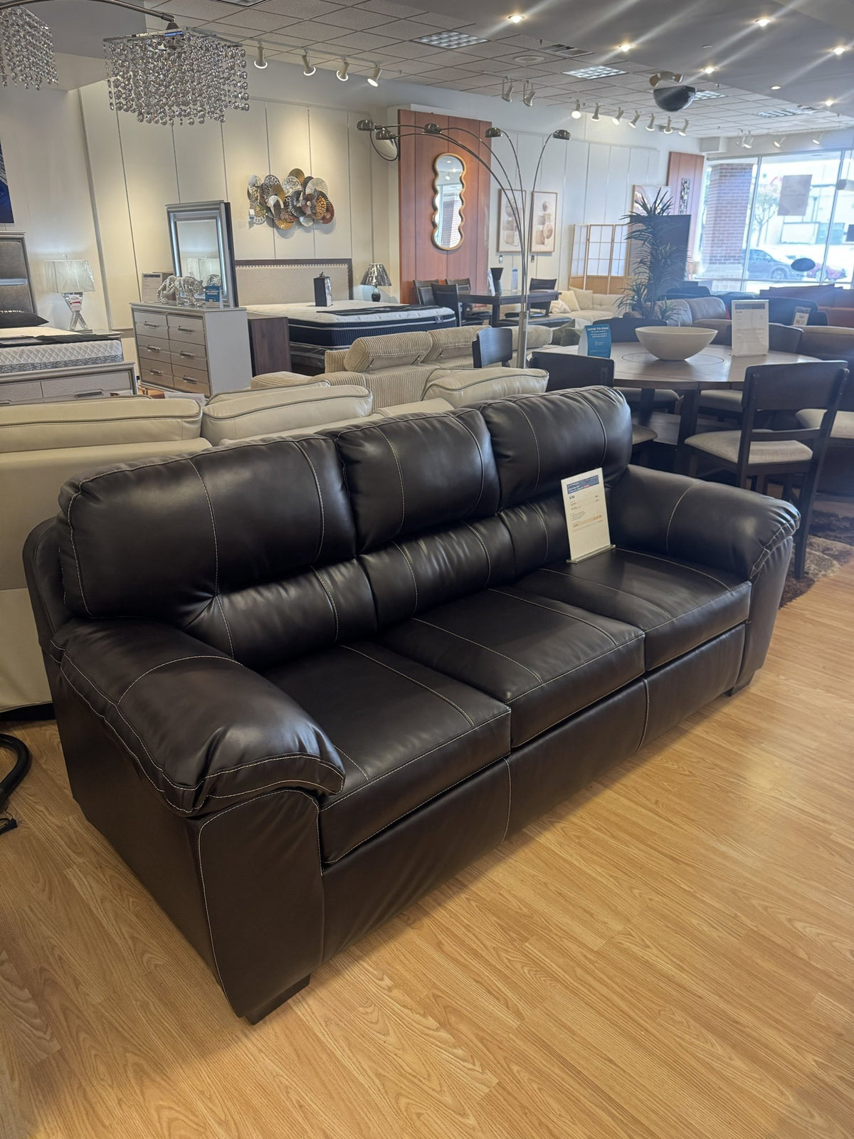 Brown faux leather sleeper sofa closeout at Palacio Furniture Arlington
