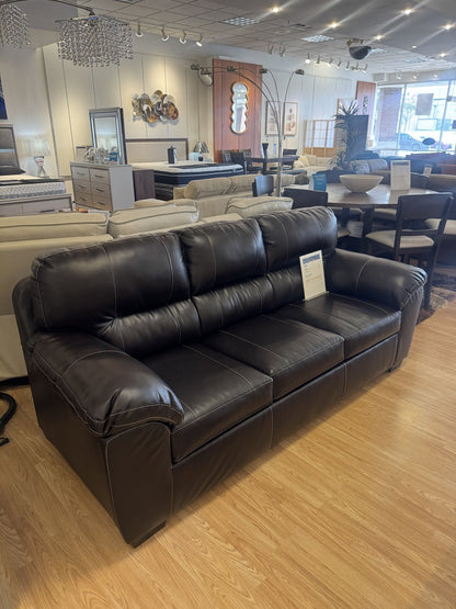 Brown faux leather sleeper sofa closeout at Palacio Furniture Arlington