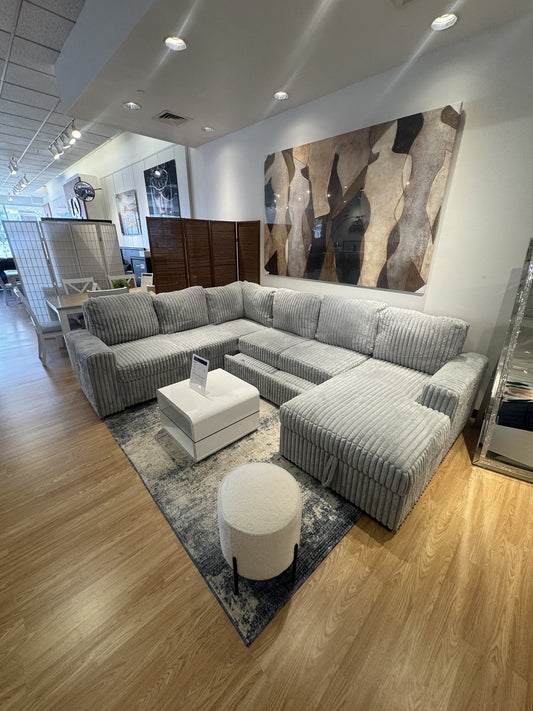 Divine grey sleeper sectional closeout at Palacio Furniture Arlington