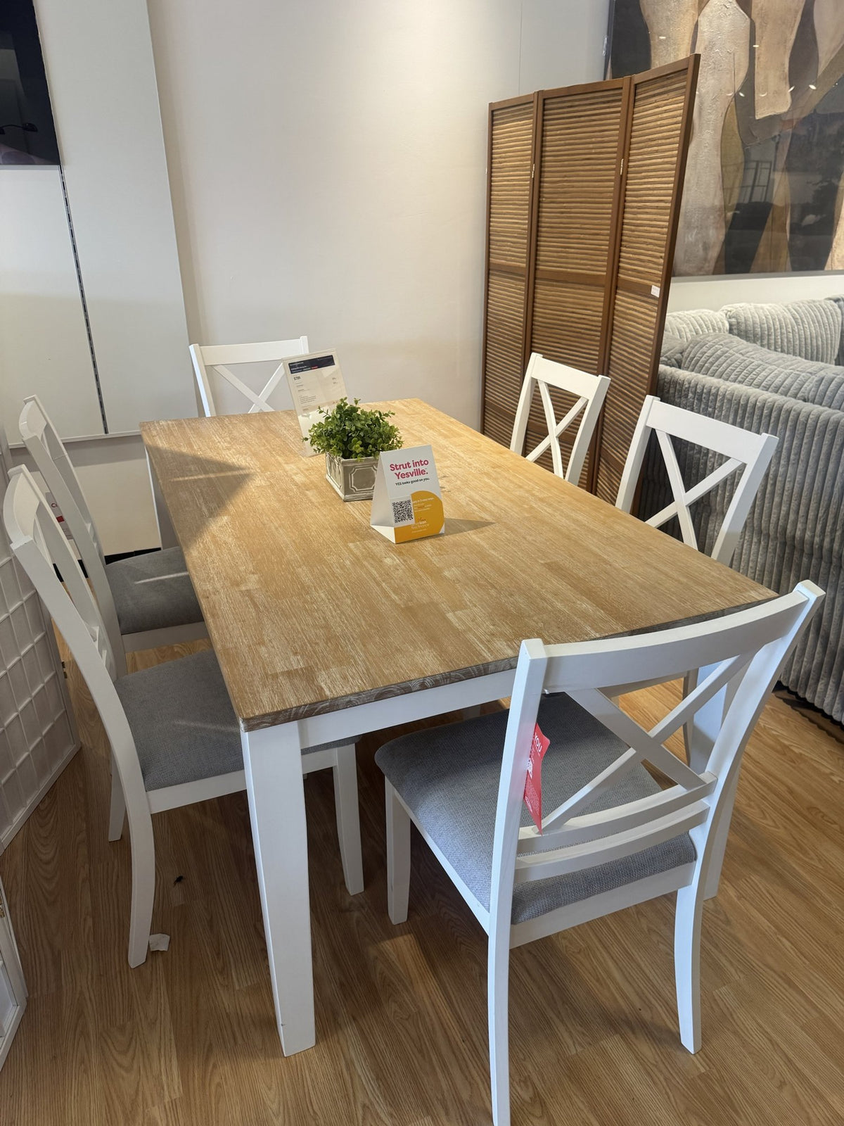 Farmhouse dining table with 6 white X-back chairs